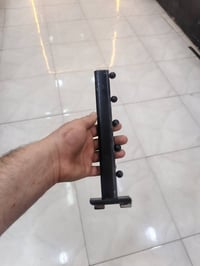 ذراع ملابس • حامل رفوف • نظافة ٨٠٪