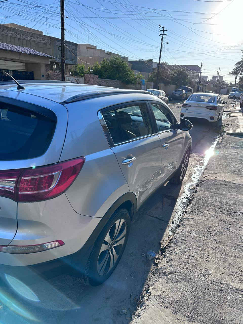 سبورتج موديل ٢٠١٢ للبيع السياره مكفوله من الصبغ والتبديل بيها بارد قليل بلجنطه مكان السياره بغداد السعر١٣٩ للاتصال***********
