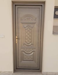 باب حديد ثقيل • نقل وتركيب • الموصل حي الكرامة