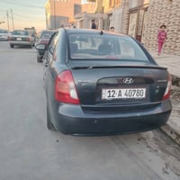 اكسن • ٢٠٠٩ • باب خلف السايق مبدل