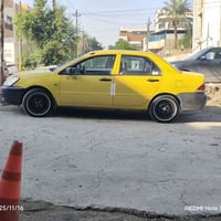 لانسر موديل 2009 سياره سعر 63 بيه مجال / 07736040566 مكاني سياره بغداد