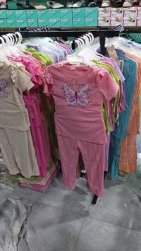 نجف حي الميلاد • بلاش • ملابس نسائية أطفال