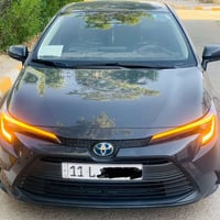 كورلا هايبرد موديل 2025 فئة LE محسن وارد أمريكي  لون إسمنتي غامق الجدي...