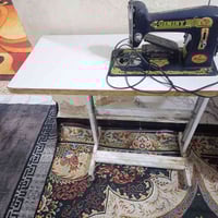 مكينة خياطة • ميز خياطة • قابلة تفاوض