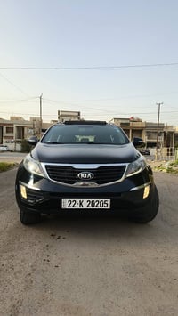 سبورتج 2013خليجي سياره مكفوله من صبغ والضربه  فول مواصفات فتحه بنوراما...