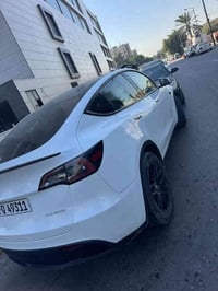 تسلا مودل وآي   موديل 2022  فول مواصفات     بيفورمنس دبل ماطور   صور ا...