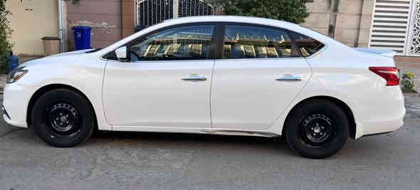 السلام عليكم اخوان 
للبيع نيسان سينترا وارد امريكي ٢٠١٩ لون ابيض 
مواصفات السيارة s.v. عاديه
شاشه و تحكم ستيرن ويل اسود كشنات مخمل لون اسود تبريد شغال مكينه و الكير سي في تي شغال وحالتهم جيده ماكو لاتاخير ولاتبخير..الحداديه و الاطارات جيده 
حادث السياره من امريكا جاملغ الامامي جهه اليسار تبديل و ربع طرف البنيد ايرباك طاك للدشبول و تكم ..ماشيه السياره١٨٠الف كيلو وقابل للزياده
دعاميه بيها شخوط و اكوو ضربه بالدوسه جهه السايق 
السيارة رقم بغداد الالماني حرف ن باسمي وشرط التحويل 
مكانها بغداد الرصافه
سعرها ١٠٤ورقه و بيها مجال ان شاء الله
للاتصال او واتس اب ***********
