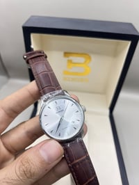 سويسري • اوتوماتيك • علبته الاصليه