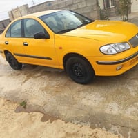 ثاني موديل 2002 جير محرك شرط تبريد شرط سنويه لل 27 تخم تاير سياره جاهز...