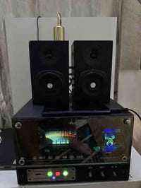 مضخم صوت • AUX • حي المرور