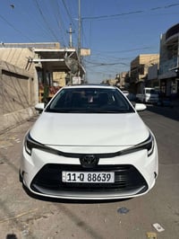 كورلا موديل ٢٠٢٤  ماشيه ٢٢ الف  مكفوله كفاله عامه  مكاني بغداد  077098...