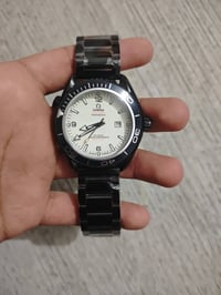 مزاد من الصفر • ساعة أوميغا • ظهر مختوم