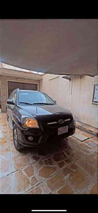 للبيع  كيا سبورتج 2009  فول مواصفات  صبغ جاملغ بوند بدون دواخل  كشن جل...