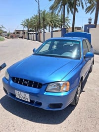 أكسنت فيرنا • ٢٠٠٢ • رقم بغداد