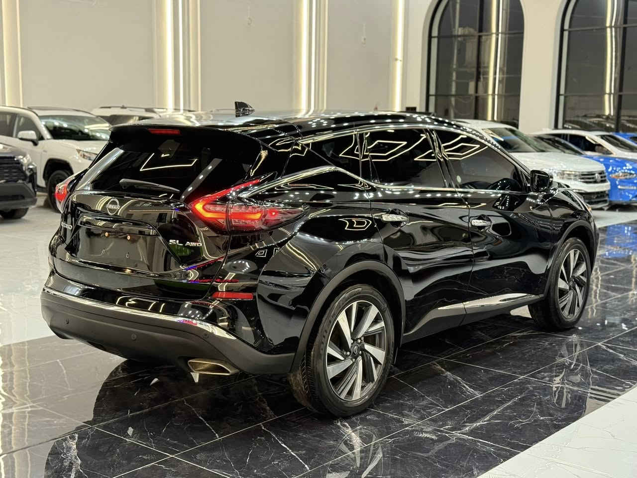 𝟐𝟎𝟐𝟑 𝐍𝐈𝐒𝐒𝐀𝐍 𝐌𝐔𝐑𝐀𝐍𝐎-𝐒𝐋.𝐀𝐖𝐃 (كيلن تايتل)

نيسان مورانو (SL.AWD) موديل : 2023

السعر : 195$

اللون : اسود

عداد المسافة : 

حجم المحرك : 3.6L V6 ( 6,سلندر )

✅ کلین تایتل مکفولة كفالة عامة ✅

المواصفات : 𝐒𝐋.𝐀𝐖𝐃

فول فول مواصفات 1/1

فتحة سقف بانورما
دەبل اکسل (𝐀𝐖𝐃) 
 بصمة ابواب 
بصمة تشغيل 
تشغيل عن بعد :
شاشة کبیر لمس
شحن وايرليس
كاميرا °360
‏‎كاميرا امامي
كاميرا جانبي
كاميرا خلفي
اوتو ستارات (𝐀𝐔𝐓𝐎 𝐒𝐓𝐀𝐑𝐓)
اوتو ستوب (𝐀𝐔𝐓𝐎  𝐒𝐓𝐎𝐏)
رادار امامي (تحديد مسار)
رادار جانبي  (نقاط عمياء)
رادار خلفي (التحذير من الاصطدام)
حساسات امامي
حساسات جانبي 
حساسات خلفي 
نظام (𝐄𝐂𝐎)
نظام (𝐍𝐎𝐑𝐌𝐀𝐋)
نظام (𝐒𝐏𝐎𝐑𝐓)
كشنات جلد
كشنات كهربائي
كشنات خزن+ميموري
كشنات هیتر
تحكمات استيرن
استيرن هیتر
تبريد لمس 
تبريد مركزي 
صندوق شفط كهربائي 
لايتات 𝐋𝐄𝐃 عدسة زينون بيلادي
بلاجيكتور  𝐋𝐄𝐃 بيلادي
بكلايتات 𝐋𝐄𝐃 بيلادي
ويل كروم 

بعد هواية مواصفات…

‏‎تفاصيل اكثر الاتصال علی ارقام التاليه ‏

☎️ ***********

☎️ ***********

‏‎عنوان📍اربيل فرع ناقلات

معرض كاليفورنيا كارس CALIFORNIA Cars
