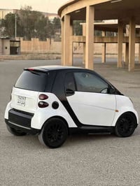 سمارت مؤديل 2011 3 پستني بةنزين تؤماتيك  فول فولة سةيارةكة  دةعم و ليد...