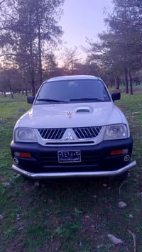 بيكاب ميتسوبيشي • ٢٠٠٦ • دبل آكسل