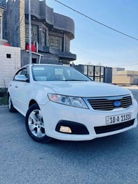 كيه اوبتمه موديل 2009 خليجي مكينه 2000دوش  رقم بابل انكليزي  بيهاا قطع...