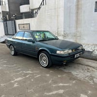 مازدا للبيع موديل 92 كير ومحرك بل شرط سياره بدون ضربه مصبوغه فقط جمالي...