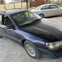 أوبل اوميكا ١٩٩٥ محرك ٢٠٠٠ كير عادي سنويا ساقطه محرك وصدر نضيف السعر ٣...