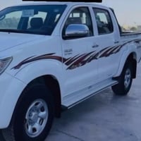 (2014) تيوتا هايلوكس فورويل اوتماتيك (السياره بيها صبغ شبرين بالجاملوغ...