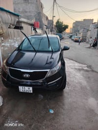 كيا سبورتج ١٦ وارد محرك 2400 باب وشاملاخ مبدل نفس الون رقم بغداد الجدي...