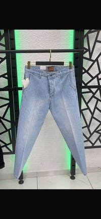 بناطير جينز • قماش أصلي • قصّة عدلة