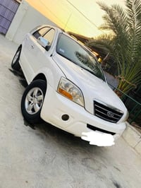 سورنتو 2008 بوليسي ابيض صدفي سياره نظيفه محرك جديد كير جديد تخم تاير ج...