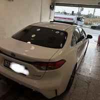 كورلا هايبرد 2023 s  محرك 1.8 هايبرد  رقم بغداد سنوية بإسمي  لايتات زي...