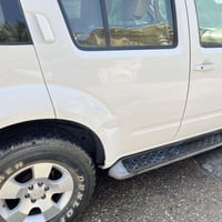 سياره نيسان پافندر 2012 ماشيه151 الف كيلو  سيارة 7 راكب فتحه سقف وشاشه...