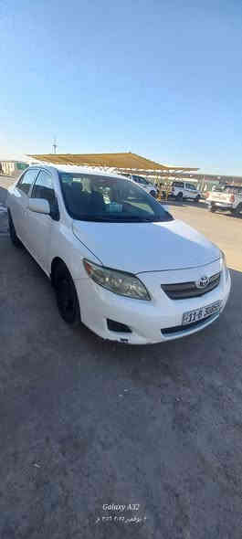 سلام عليكم كورلا موديل ٢٠٠٩ الضرر البنيد مبدل وقطعتين صبغ الجاملغات المامية وبيها الباب الورة بي طخة موضح بل الصورة  شواصي لغود مقفولة مكينة صدر تبريد تاير كير كلة مكفول بسمي بيها منضومة الغاز سيارة خير من اللة السعر ٩٥ بيها مجال بصيط *********** مكاني بغداد مدينة الصدر
