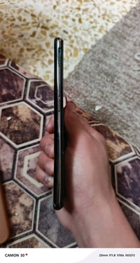 ريلمي كيو ٣ برو • ١٢٨ • بصمة متوقفة