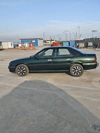 أوبل • ١٩٩٥ • مكينة ١٫٨