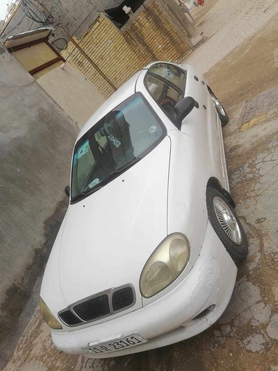 السلام عليكم للبيع دايو لانوس موديل 1998 رقم بغداد مكينه وكير جدد صدر امامي خلفي جديد مكفولة من الضربه والتبديل  تبريد شغال سنويه 2028باسمي مكان بغداد السعر 31 وبيها مجال بسيط رقم الهاتف ***********
