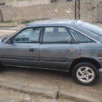 مازدا كابون موجود . الشرعي موجود . محرك 8بخاخ نظيف  07730010270