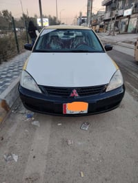 لانسر ٢٠١٠ • بدون حادث • رقم ديالى