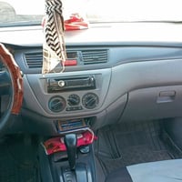 لانسر ٢٠١١ • محرك نضيف • رقم بغداد