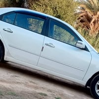 للبيع سوناتا 2009 خليجي ابيض صدفي  رقم بغداد بأسمي محرك 2000 دوش  فوول...