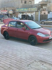نيسان تيدا • ٢٠٠٧ • قطعتين صبغ