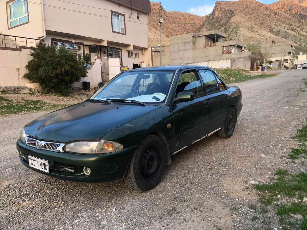 به ناوى خواى گه وره     پرؤتؤن 2002 
ته بريد سادوو گه رم 
دووجام كاره باى
گيرو مه كينه ى بئ عه يبه زؤر به هه لمه ته 
به نزين زؤرزؤر كه م ئه خوات  
تندوو تؤله بئ مه سره فه 
4تايه ى تازه م له ژيره 
سه ياره كه علوجه به شه رتى مووسوو براوه و مالى 
كه س نه بيت   ده عمى پيوه نييه  خايسى نيه 
سعرى  16 گه لاو معامه له يه كى برايان 
شوين دوكان 
***********
*********** دخان, السليمانية
