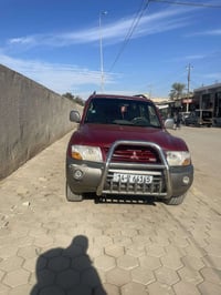 باجيرو موديل 2001 مكفوله من الضربه مصبوغه  الجماليه  مكينه وكير مكفولا...