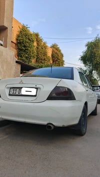 لانسر بومه ٢٠١١ بومه مكينة ٢٠٠٠ بيها خيط تبخير جاملغ خلفي مبدل تبريد ث...