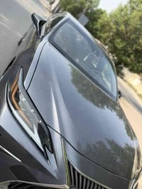 Es300h 2021 هايبرد وبانزين رقم بغداد ضربه امامية خفيفة جدا   مكفولة من...