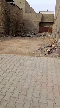 قطعه بحي الحكيم جسر ديالى للبيع 07711344607