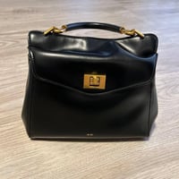 شنطة لوسيا • جلد نباتي • أسود