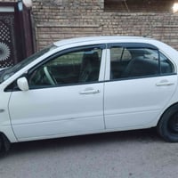 لانسر موديل 2007مراوس لانسر صفره اوتوماتيك رقمي 07708841377