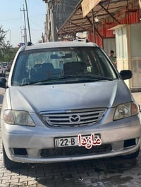 مازدا • ٧ راكب • أوراق