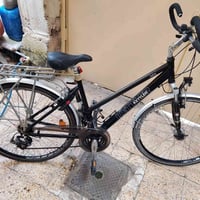 دراجة • حي الامن • وسيط