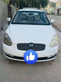 أكسنت • ٢٠١٠ • بغداد العبيدي