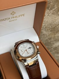 باتيك فيلب • شمسي قمري • زجاج زفير